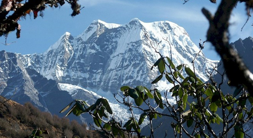 A view of Mera peak along the forest trek through the Everest Region in Nepal